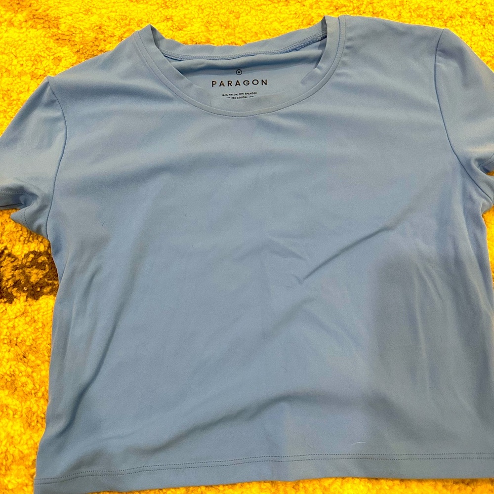 Cropped tee. Size medium. Color is taffy.